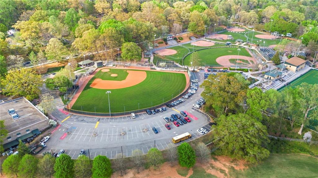 4555 Runnemede Road Northwest Atlanta, GA 30327 - Photo 45 of 51 an aerial view of a swimming pool patio yard and outdoor seating