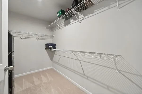 a view of a room with racks on the wall