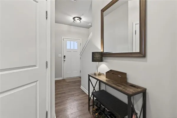 a bathroom with a sink a mirror and a toilet