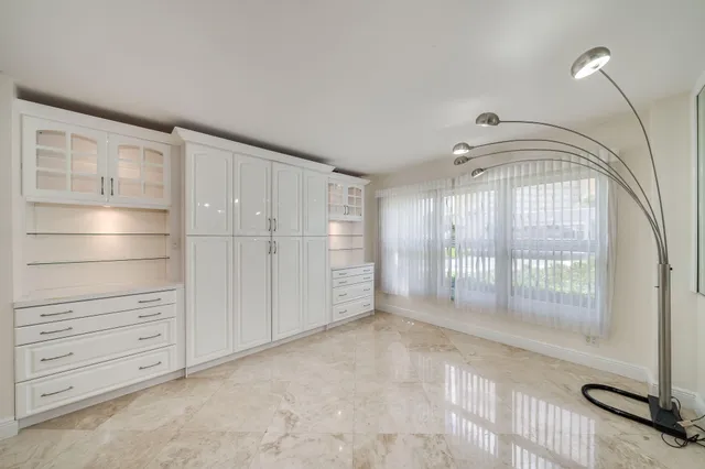 wooden view of an empty walk in closet