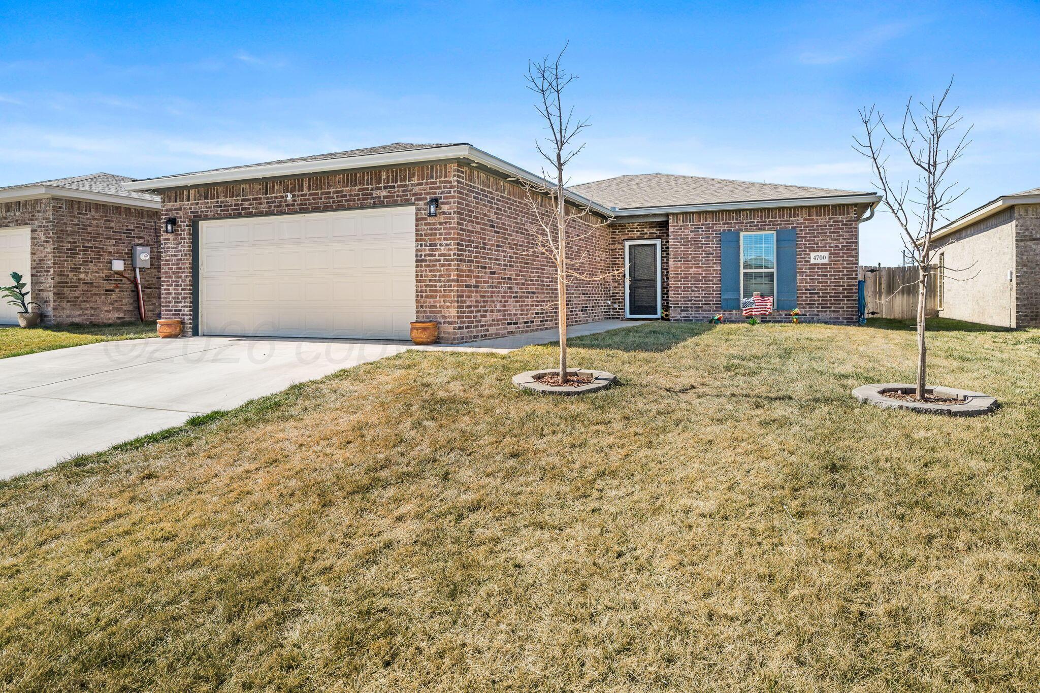 4700 Longbird Street Amarillo, TX 79118 - Photo 2 of 23 a backyard of a house
