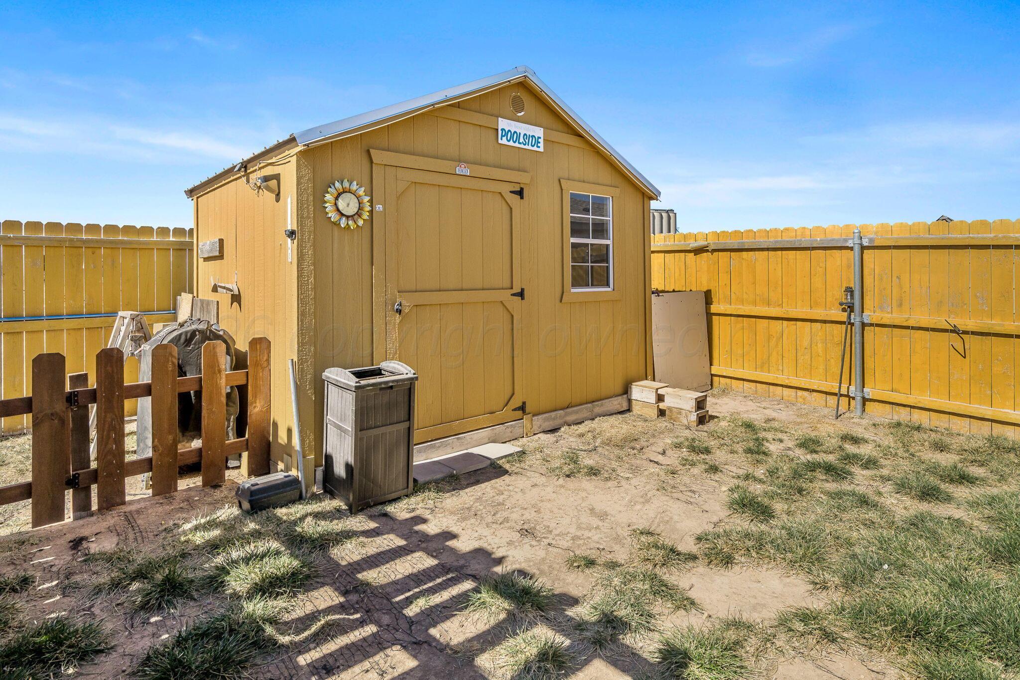 4700 Longbird Street Amarillo, TX 79118 - Photo 23 of 23 a back yard of a house