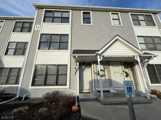 a front view of a house with a porch