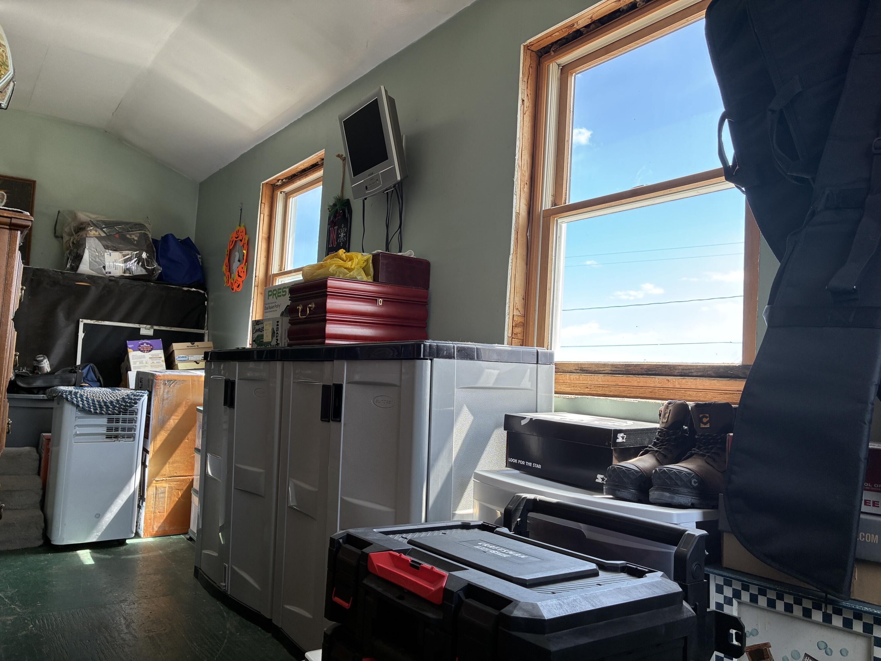 21 Sadler Point Road Jonesport, ME 04649 - Photo 13 of 51 21 sadler upstairs bedroom storage