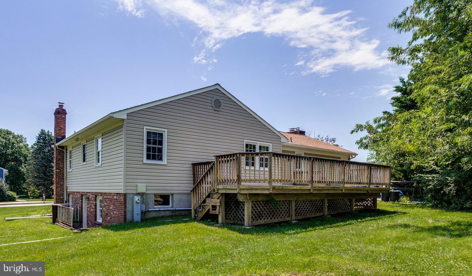 4595 Roundhill Road Ellicott City, MD 21043 - Photo 31 of 35 Rear Yard with Large Composite Deck