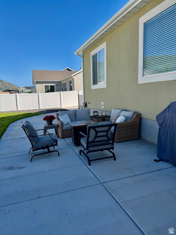 315 South Sherman Street Mapleton, UT 84664 - Photo 24 of 30 Expansive concrete patio with a stucco exterior