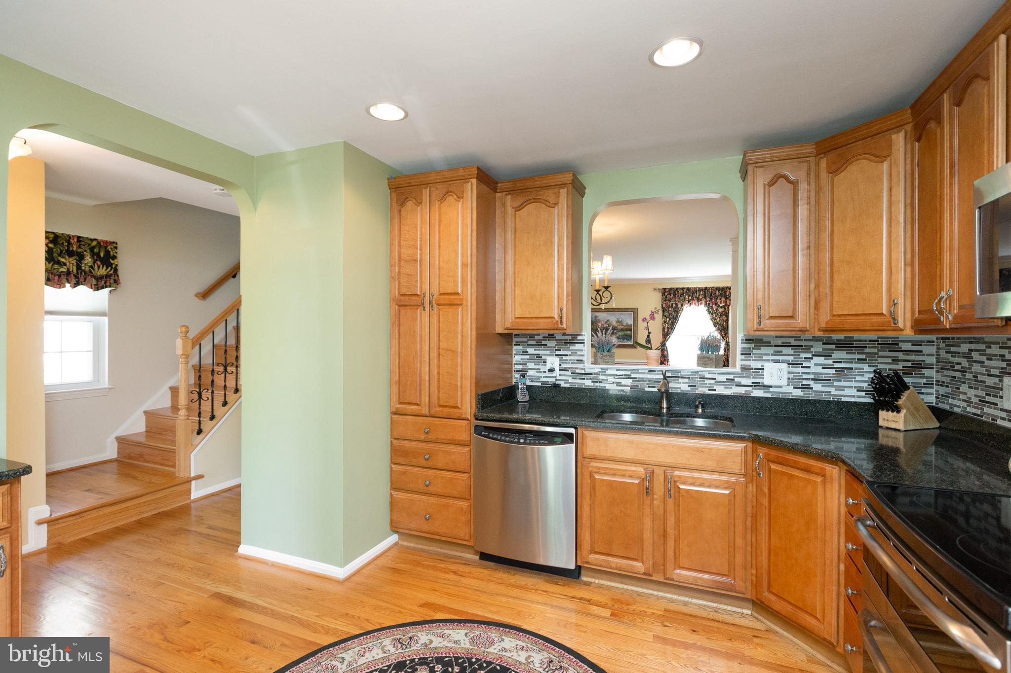 1900 Flowering Tree Terrace Silver Spring, MD 20902 - Photo 11 of 37 View towards foyer