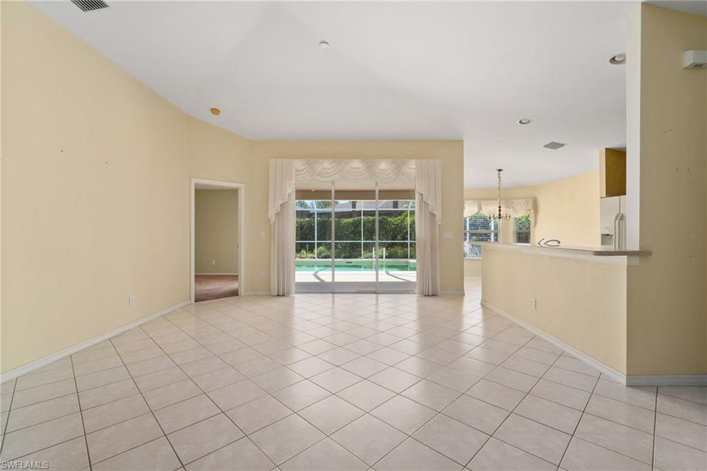 9281 Lanthorn Way Estero, FL 33928 - Photo 15 of 30 a view of an empty room with a window