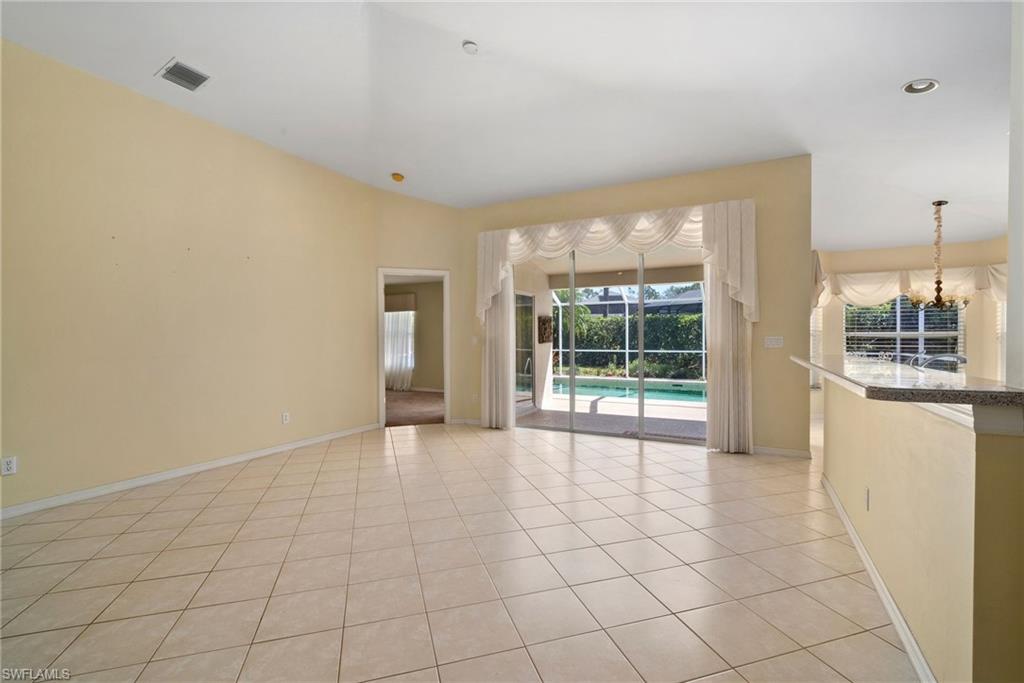 9281 Lanthorn Way Estero, FL 33928 - Photo 16 of 30 a view of an empty room with a window