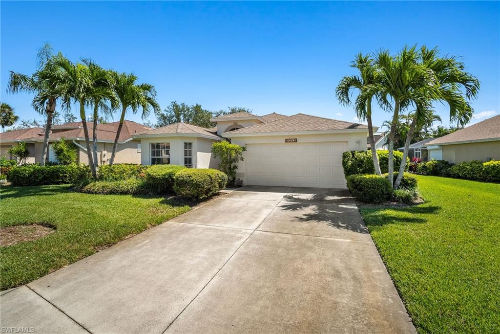 9281 Lanthorn Way Estero, FL 33928 - Photo 2 of 30 a view of a house with a yard and potted plants