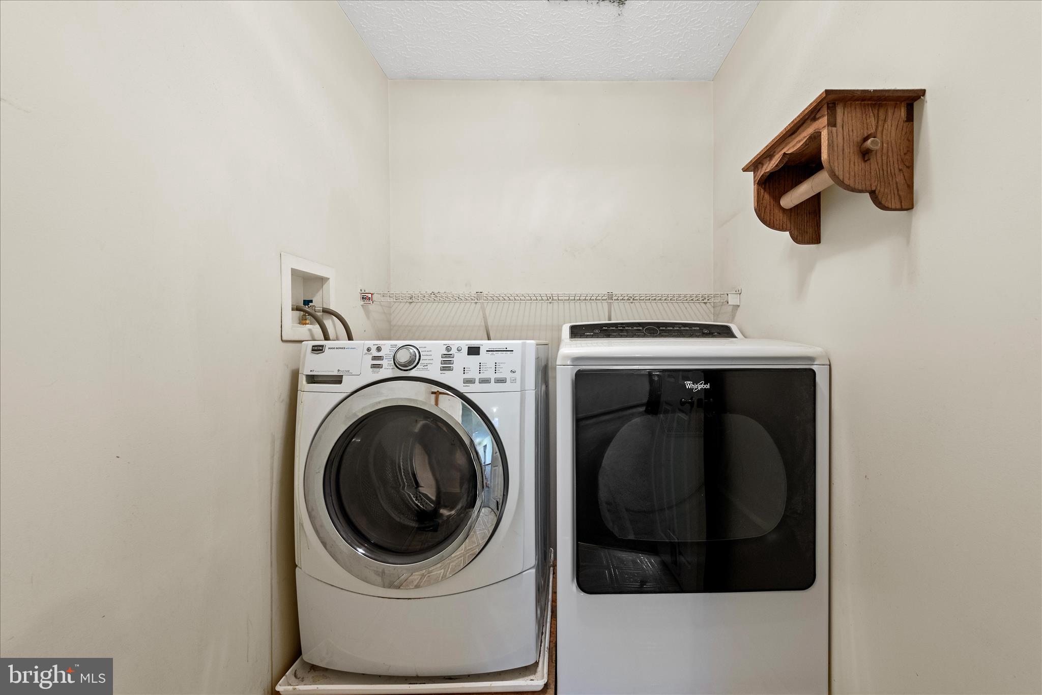4403 Back Mountain Road Winchester, VA 22602 - Photo 25 of 73 a utility room with dryer and washer