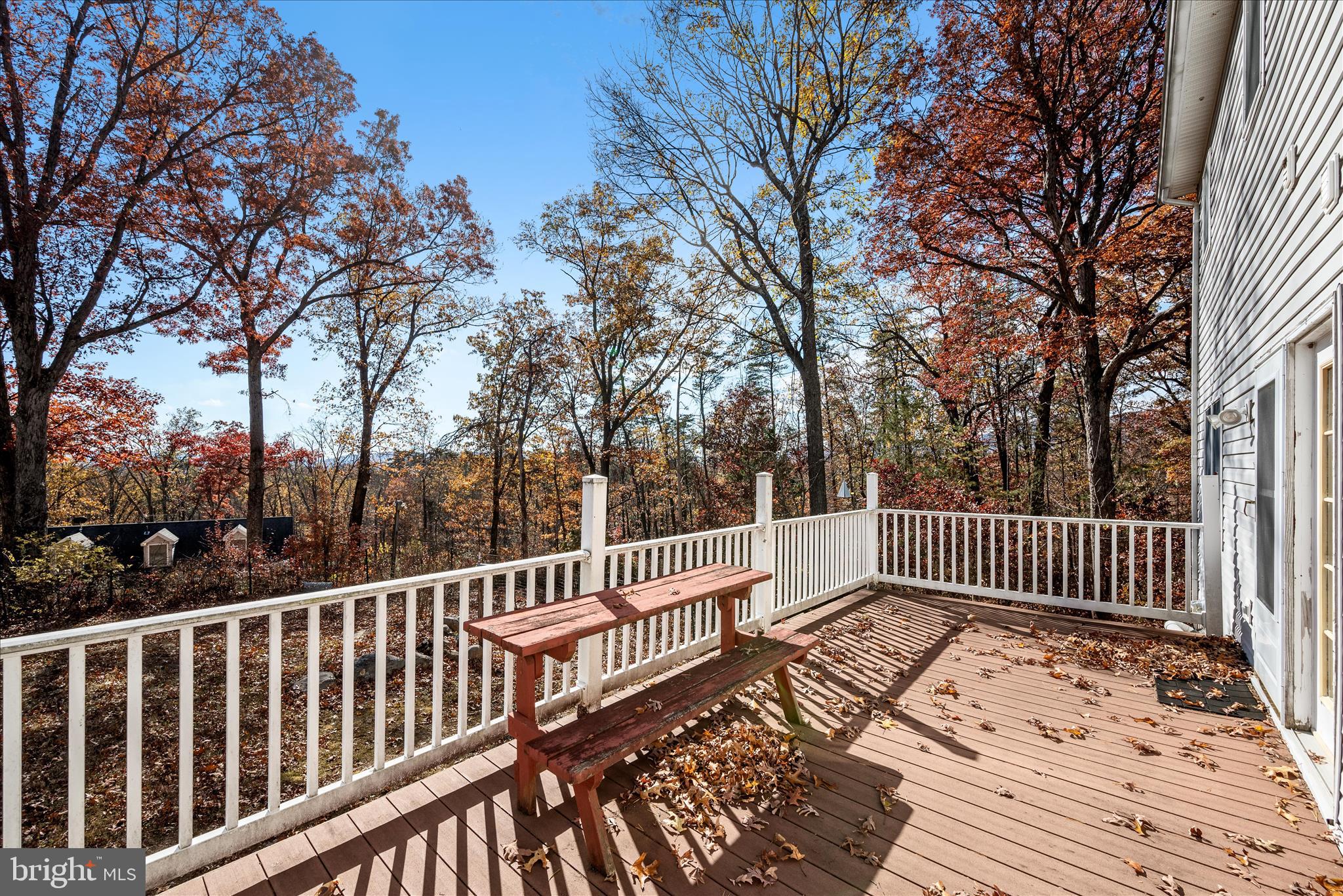 4403 Back Mountain Road Winchester, VA 22602 - Photo 41 of 73 a view of balcony with wooden floor and fence
