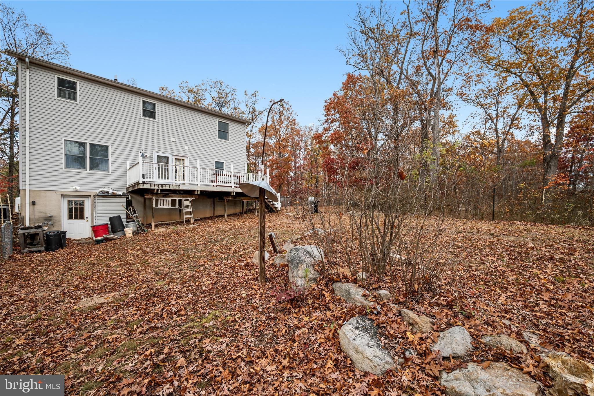 4403 Back Mountain Road Winchester, VA 22602 - Photo 44 of 73 a view of a house with a yard