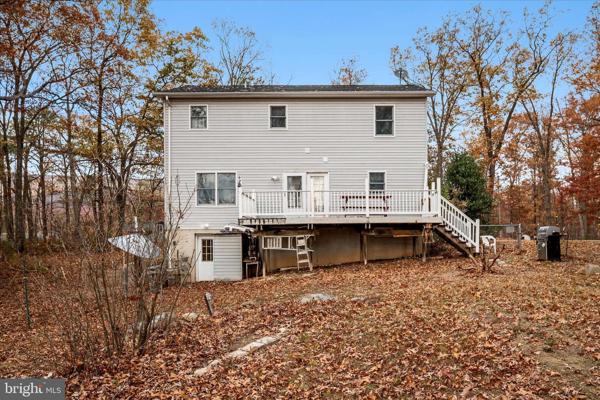 4403 Back Mountain Road Winchester, VA 22602 - Photo 45 of 73 a view of a house with a yard and sitting area