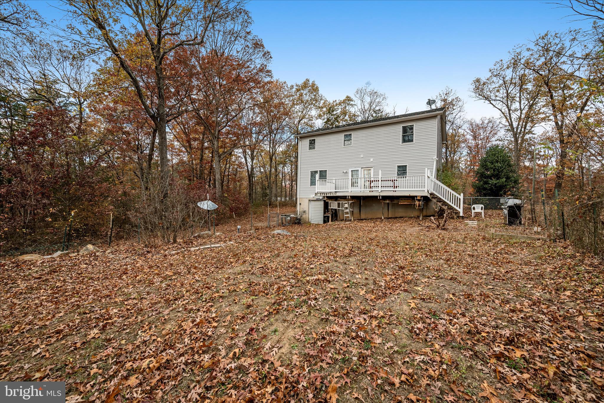 4403 Back Mountain Road Winchester, VA 22602 - Photo 48 of 73 a view of a house with a yard covered with snow