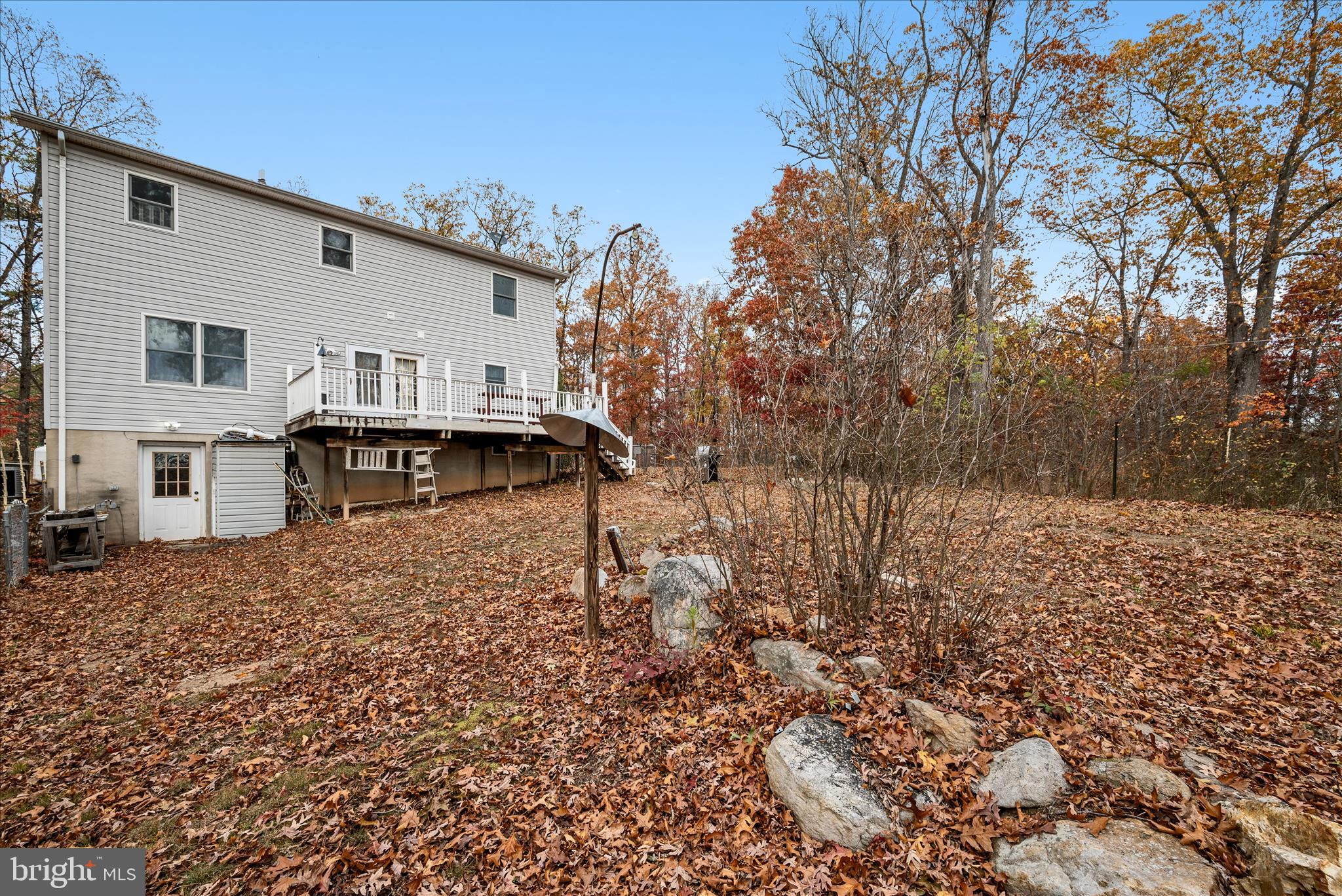 4403 Back Mountain Road Winchester, VA 22602 - Photo 49 of 73 a view of a house with a yard
