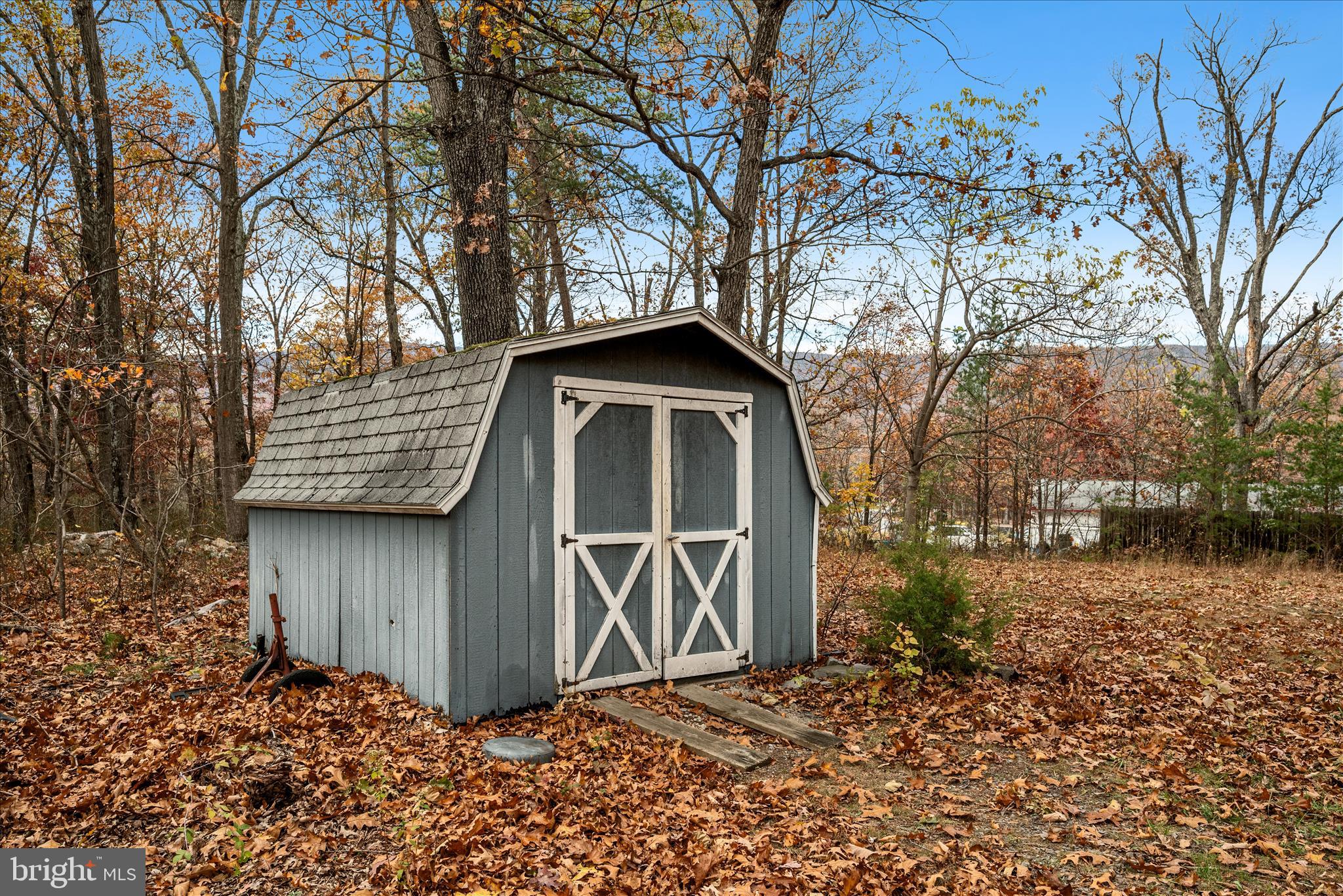 4403 Back Mountain Road Winchester, VA 22602 - Photo 50 of 73 a front view of a house with garden