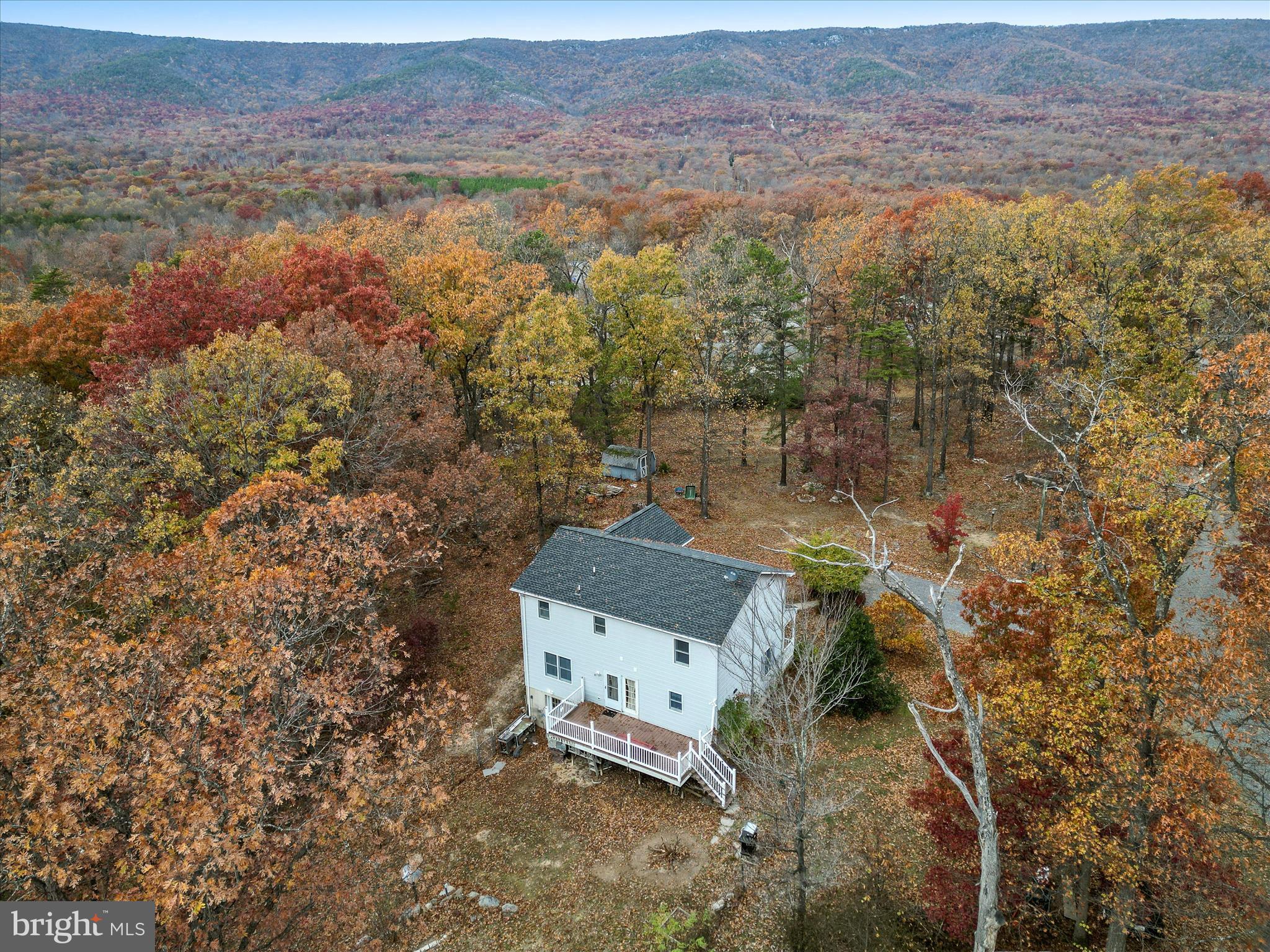 4403 Back Mountain Road Winchester, VA 22602 - Photo 52 of 73 an aerial view of a house with a yard