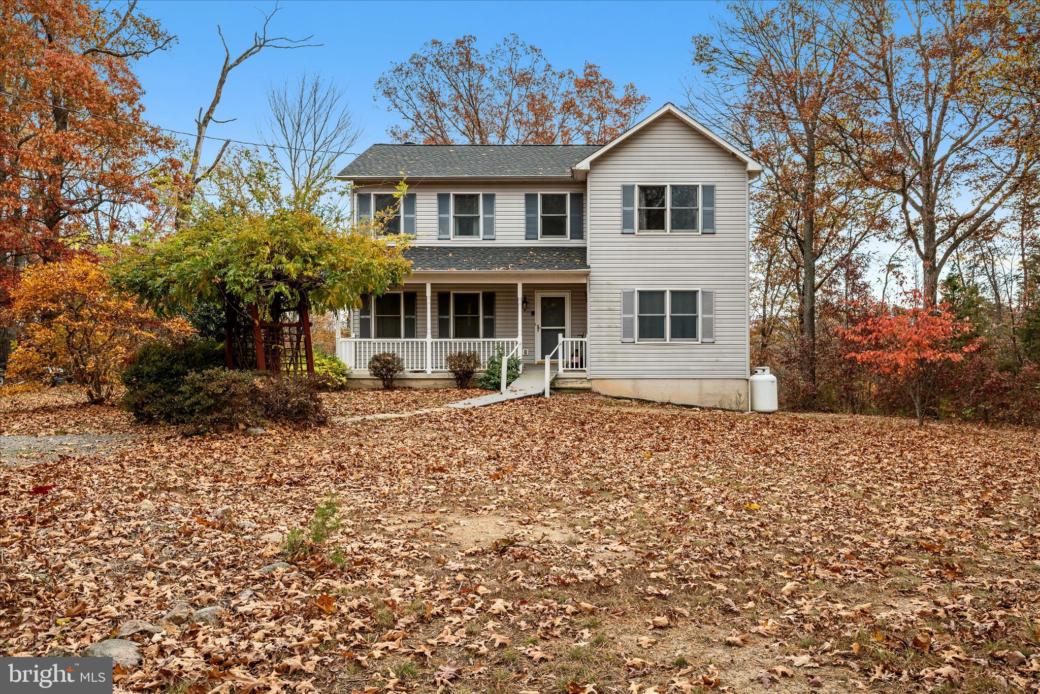 4403 Back Mountain Road Winchester, VA 22602 - Photo 65 of 73 a front view of a house with a yard