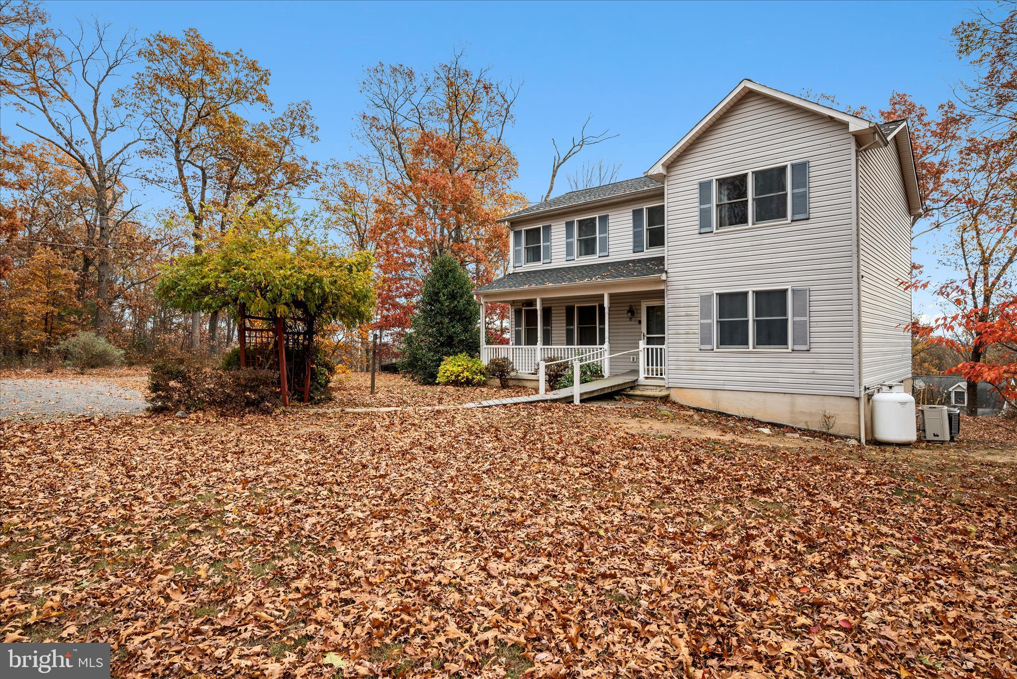 4403 Back Mountain Road Winchester, VA 22602 - Photo 66 of 73 a house with trees in the background