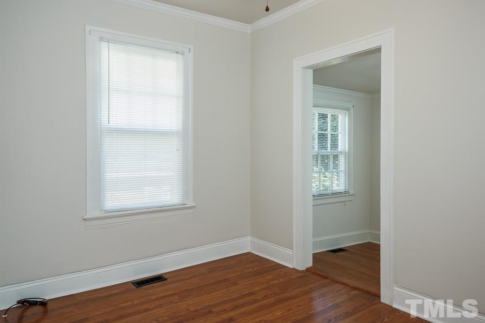 1306 Filmore Street Raleigh, NC 27605 - Photo 14 of 25 an empty room with windows and closet