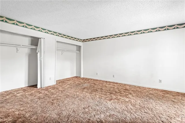 a view of a room with an empty space