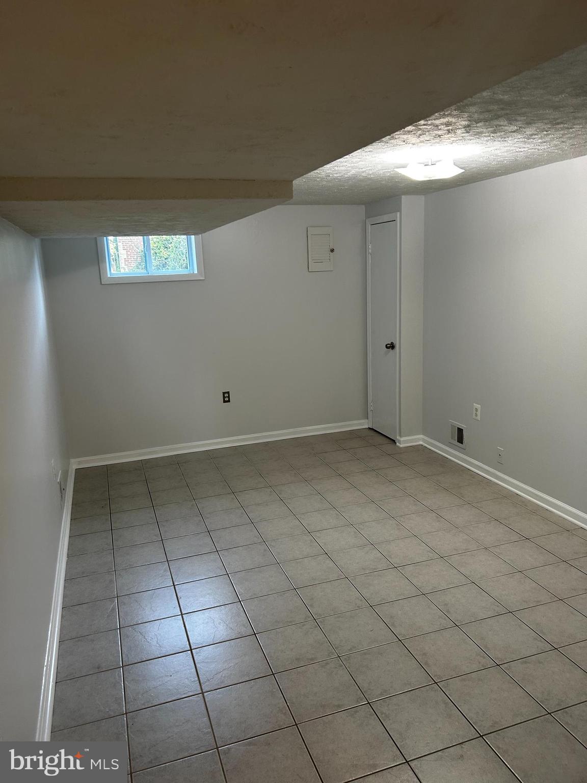 1906 Reedie Drive Silver Spring, MD 20902 - Photo 16 of 19 Large lower level bonus room