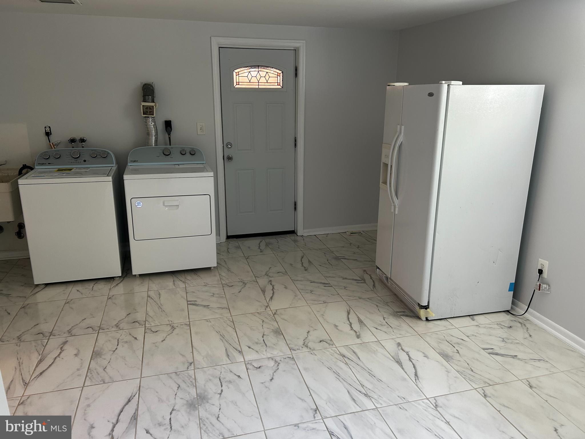 1906 Reedie Drive Silver Spring, MD 20902 - Photo 17 of 19 Large laundry w/ extra refrigerator