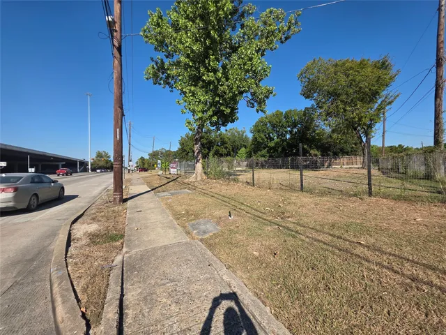 a view of street with with cars