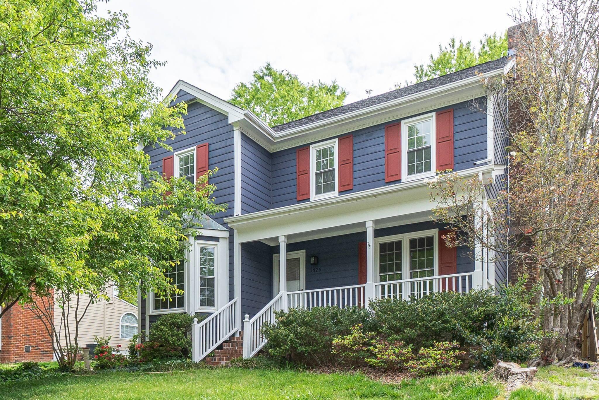 3525 East Jameson Road Raleigh, NC 27604 - Photo 1 of 15 a view of a house with a yard