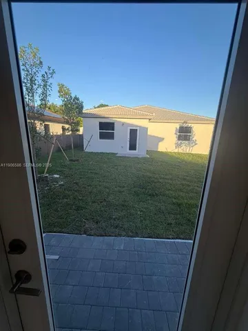 a bathroom with a double vanity sink toilet and shower