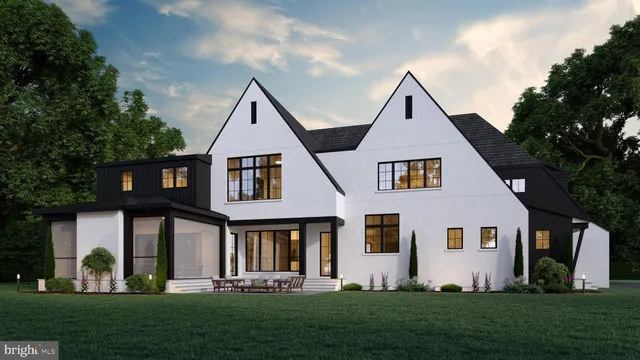 a front view of a house with a yard and porch