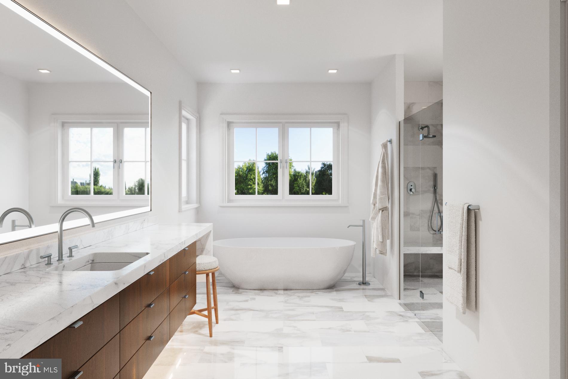 6911 Elm Street McLean, VA 22101 - Photo 5 of 11 a bathroom with a tub sink and mirror