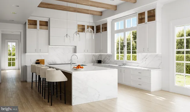a kitchen that has a cabinets and a table in it