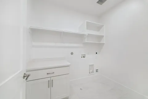 a view of an empty walk in closet