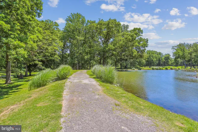 a view of a lake with a big yard