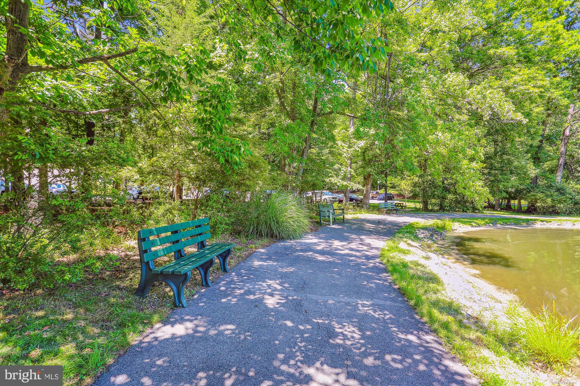 15115 Interlachen Drive, Unit 3308 Silver Spring, MD 20906 - Photo 25 of 50 a view of a lake with outdoor space