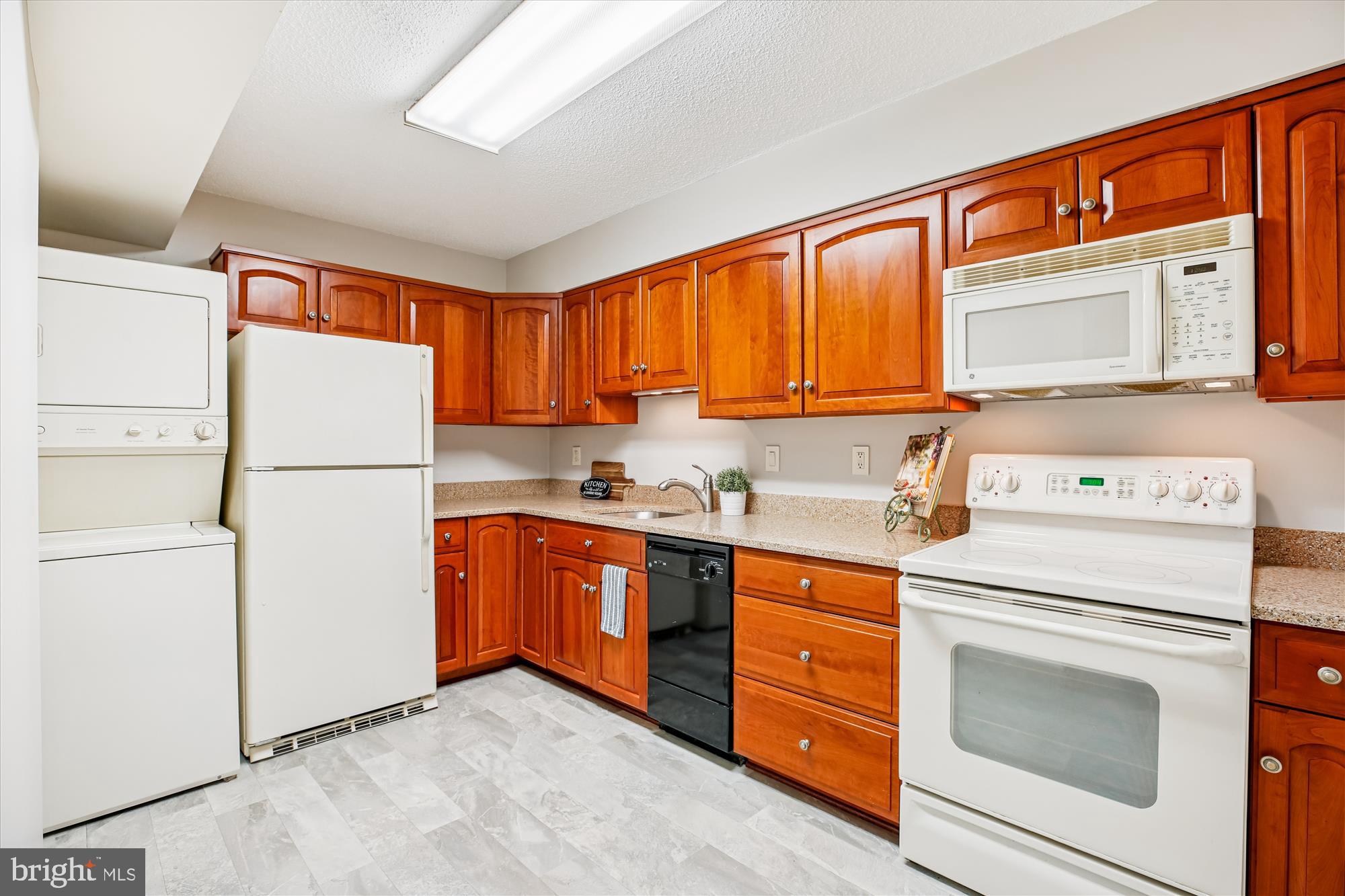 15115 Interlachen Drive, Unit 3308 Silver Spring, MD 20906 - Photo 9 of 50 a utility room with washer and dryer