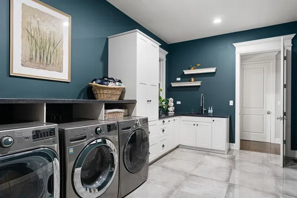 a view of storage utility and utility room
