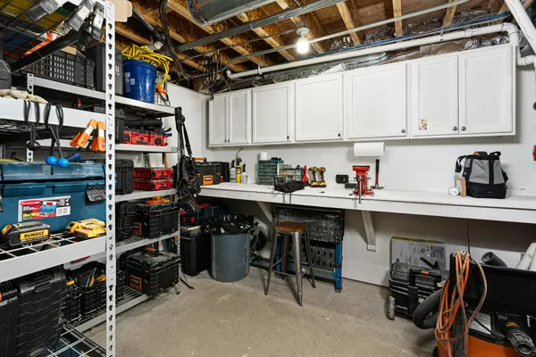a view of a garage with storage