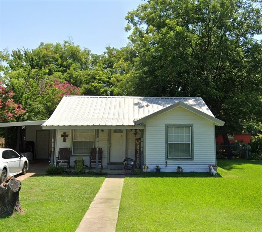 1916 Liberty Street Bonham, TX 75418 - Photo 1 of 1 a view of a house with a yard patio and swimming pool