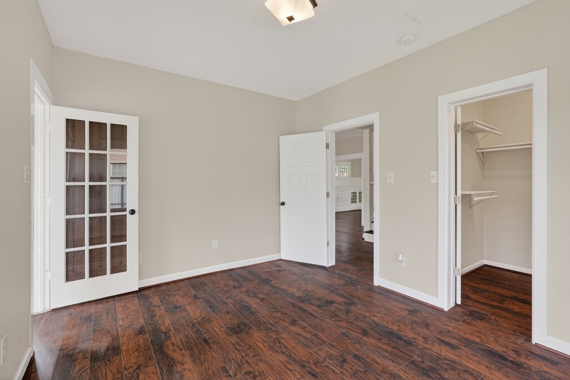 5401 North Capitol Street Houston, TX 77011 - Photo 16 of 39 wooden floor in an empty room with a window