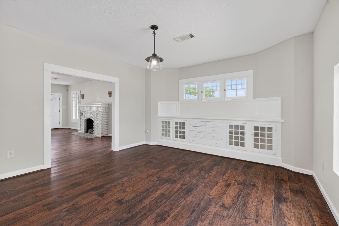 5401 North Capitol Street Houston, TX 77011 - Photo 20 of 39 a view of an empty room with wooden floor and a window