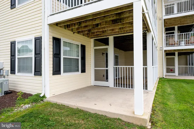 a view of a large body of water with a building in the background