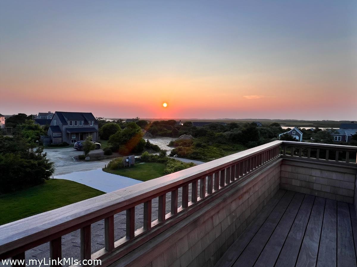 3 Tautemo Way Nantucket, MA 02554 - Photo 22 of 57 a view of balcony with wooden floor and city view