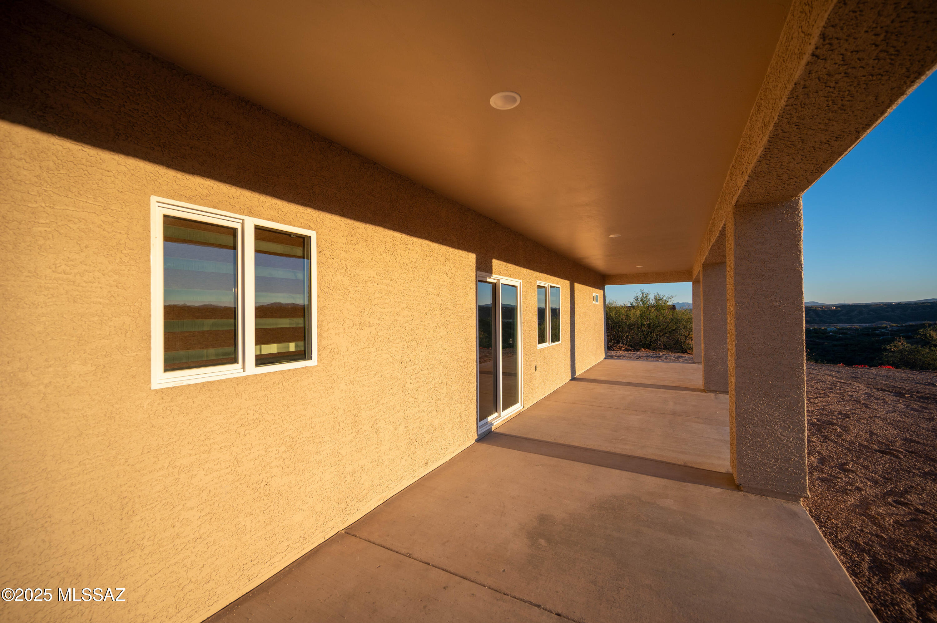 497 Calle Cipres Rio Rico, AZ 85648 - Photo 14 of 50 a view of a house with a backyard