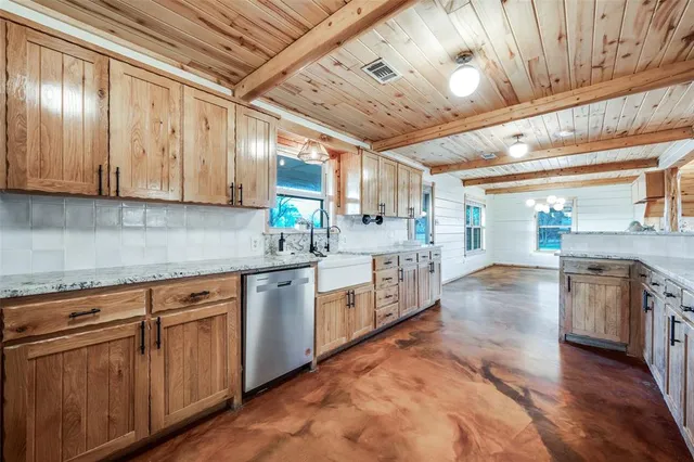 a view of a fireplace with an empty room