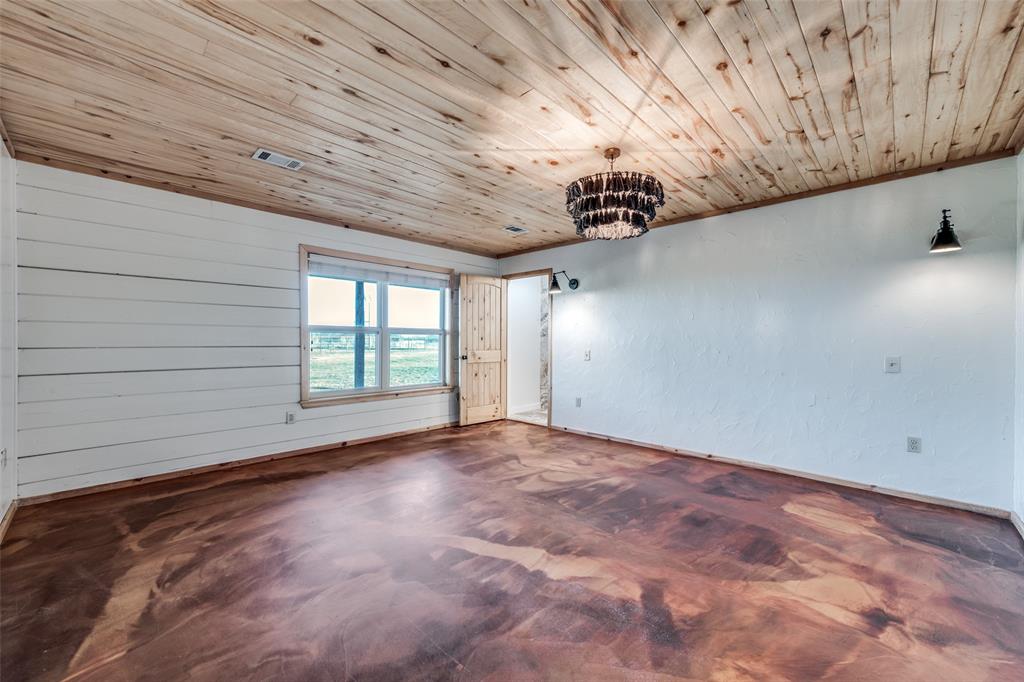 1353 Spring Creek Road Collinsville, TX 76233 - Photo 17 of 40 a view of an empty room with a window