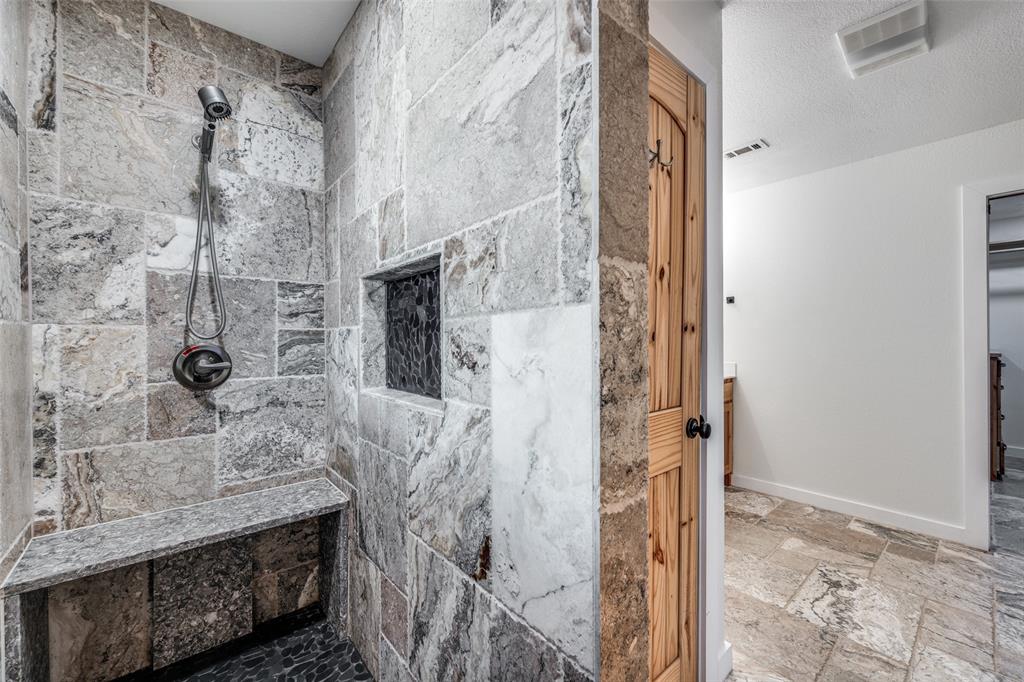 1353 Spring Creek Road Collinsville, TX 76233 - Photo 19 of 40 a bathroom with a shower and a sink