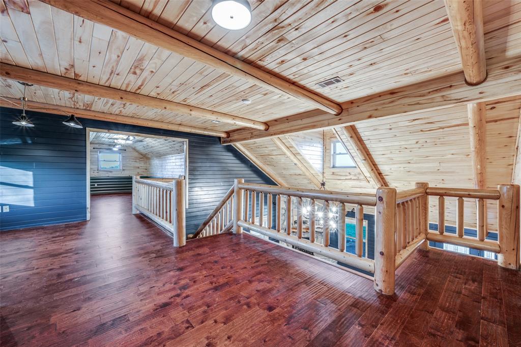 1353 Spring Creek Road Collinsville, TX 76233 - Photo 22 of 40 a view of an entryway with wooden floor